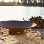 Fire Pit Art Asia round steel wood-burning fire bowl for cold-climate patios