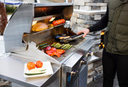 Atlas 36 inch freestanding gas grill in backyard outdoor kitchen lifestyle