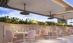 Bromic Eclipse Electric pendant heaters with 24 inch twin poles warming an outdoor commercial dining terrace