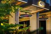 Bromic Eclipse Electric heaters ceiling mounted on short straight poles at the Mandarin Oriental Hotel terrace